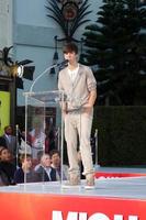 LOS ANGELES, JAN 26 - Justin Bieber speaks at the Michael Jackson Immortalized Handprint and Footprint Ceremony at Graumans Chinese Theater on January 26, 2012 in Los Angeles, CA photo