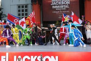 LOS ANGELES, JAN 26 - Cirque du Soleil Immortal Troupe perform at the Michael Jackson Immortalized Handprint and Footprint Ceremony at Graumans Chinese Theater on January 26, 2012 in Los Angeles, CA photo