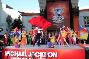 LOS ANGELES, JAN 26 - Cirque du Soleil Immortal Troupe perform at the Michael Jackson Immortalized Handprint and Footprint Ceremony at Graumans Chinese Theater on January 26, 2012 in Los Angeles, CA photo