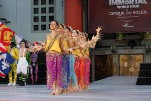 LOS ANGELES, JAN 26 - Cirque du Soleil Immortal Troupe perform at the Michael Jackson Immortalized Handprint and Footprint Ceremony at Graumans Chinese Theater on January 26, 2012 in Los Angeles, CA photo