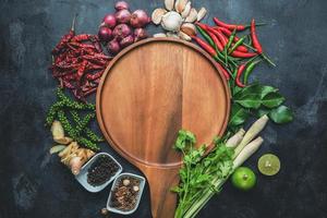 Healthy food clean eating selection. Herbs and spices Various organic vegetables Placed on the table. Raw materials of cooking preparation. photo