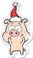 happy distressed sticker cartoon of a pig wearing santa hat vector