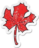 retro distressed sticker of a cartoon red maple leaf vector