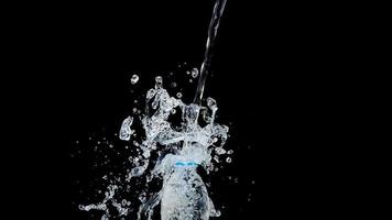 Abstract water jet crashes on a black background photo