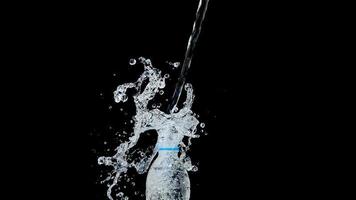 Abstract water jet crashes on a black background photo