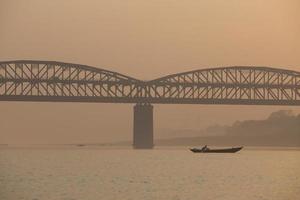 Sunrise on the Ganga river, Varanasi, India photo