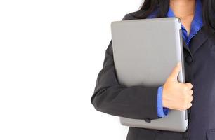 Business woman posing with laptop photo