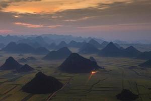 Yellow rapeseed flower field in Luoping, China photo