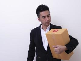 Shop assistant brings the parcel, isolated, white background photo