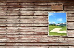 an wooden door with a window and cloudy sky photo