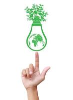 Hands holding green ecology light bulb
