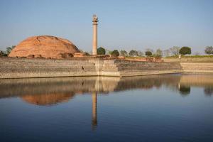 Ananda Stupa and Ashoka pillar photo