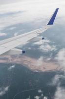 View of clouds from a airplane window photo