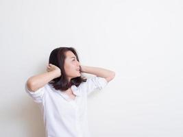 Portrait of young asian woman standing and smiling photo