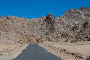 High altitude road in mountains photo