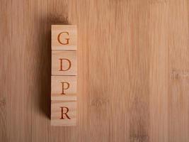 Wooden floor with empty wooden cubes as a template for words photo