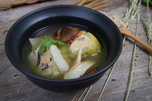 Stuffed bitter gourd with minced pork in clear soup photo