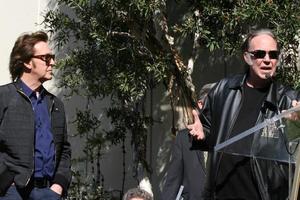 LOS ANGELES, FEB 9 - Paul McCartney, Neil Young at the Hollywood Walk of Fame Ceremony for Paul McCartney at Capital Records Building on February 9, 2012 in Los Angeles, CA photo