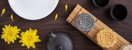 Colorful beautiful moon cake, mung bean cake, Champion Scholar Pastry cake for Mid-Autumn festival traditional gourmet dessert snack, top view, flat lay. photo