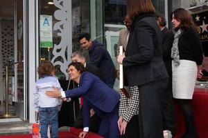 LOS ANGELES, APR 2 - Orlando Bloom, Flynn Bloom at the Orlando Bloom Hollywood Walk of Fame Star Ceremony at TCL Chinese Theater on April 2, 2014 in Los Angeles, CA photo