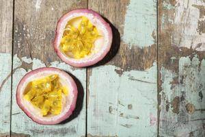 Vegetarian healthy food passion fruit on wood table close up. photo