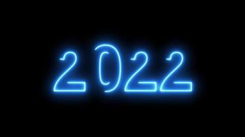 animación de video, luz de neón abstracta con los números, representa el año nuevo. video