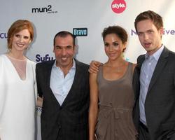 LOS ANGELES, AUG 1 - Sarah Rafferty, Rick Hoffman, Meghan Markle, Patrick J Adams arriving at the NBC TCA Summer 2011 All Star Party at SLS Hotel on August 1, 2011 in Los Angeles, CA photo