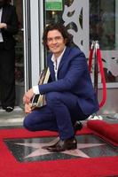 LOS ANGELES, APR 2 - Orlando Bloom at the Orlando Bloom Hollywood Walk of Fame Star Ceremony at TCL Chinese Theater on April 2, 2014 in Los Angeles, CA photo