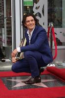 LOS ANGELES, APR 2 - Orlando Bloom at the Orlando Bloom Hollywood Walk of Fame Star Ceremony at TCL Chinese Theater on April 2, 2014 in Los Angeles, CA photo