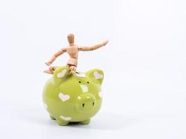 puppet doll and piggy bank ,isolate white background with clipping path photo