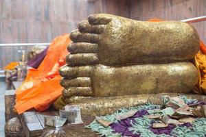 Reclining Buddha gold statue photo