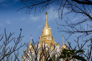 Nine tops pagoda, thai style at thai temple kushinagar, India photo