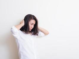 Portrait of young asian woman standing and smiling photo