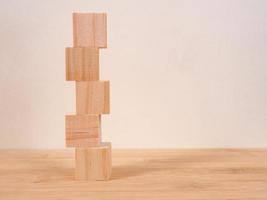 Wooden floor with empty wooden cubes as a template for words photo