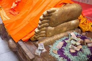 Reclining Buddha gold statue photo