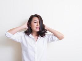 Portrait of young asian woman standing and smiling photo