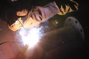 Welder in a factory photo