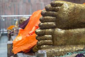 Reclining Buddha gold statue photo
