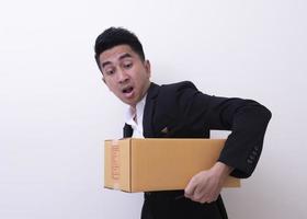 Shop assistant brings the parcel, isolated, white background photo