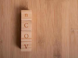 Wooden floor with empty wooden cubes as a template for words photo