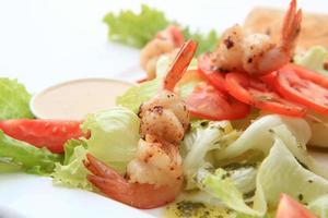 Green salad with shrimps photo