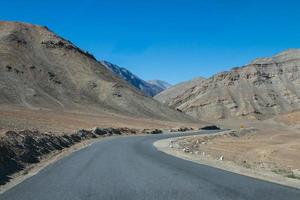 High altitude road in mountains photo