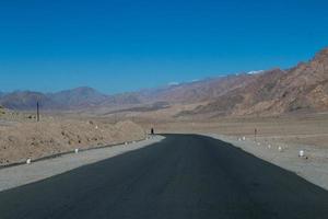 High altitude road in mountains photo