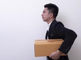 Shop assistant brings the parcel, isolated, white background photo