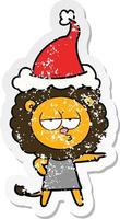 distressed sticker cartoon of a bored lion wearing santa hat vector