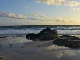 Scenic Views of Dawn on a Deserted Beach in Aruba photo