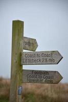 Wooden Sign Post Along the Coast to Coast photo