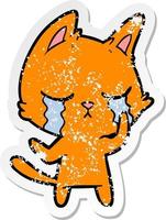 distressed sticker of a crying cartoon cat vector