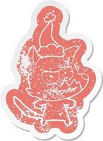 cartoon distressed sticker of a grinning fox wearing santa hat vector