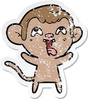 distressed sticker of a crazy cartoon monkey vector